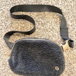 Lululemon Black Fleece Bag with Gold Zipper